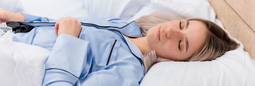 young woman napping with good sleep posture
