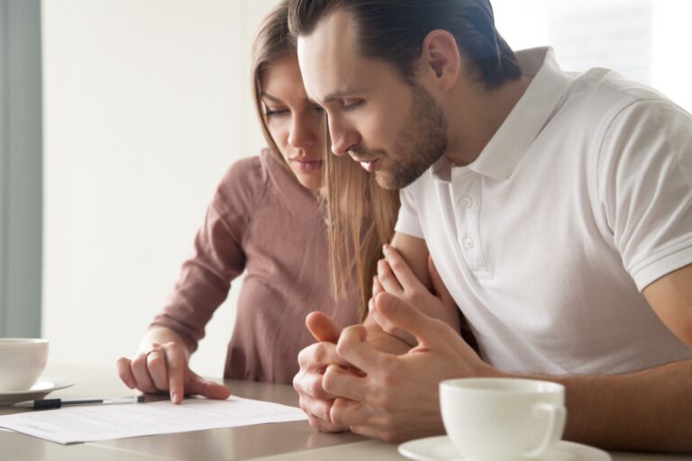 couple reviewing paperwork